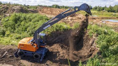 Экскаваторы - UMG Экскаватор одноковшовый колесный E200W