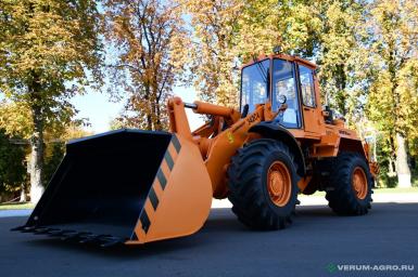 Фронтальные погрузчики - АМКОДОР 342С4 устройство для быстрой смены рабочих органов имеет