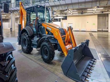 Экскаваторы - UMG Экскаватор-погрузчик TLB 845 