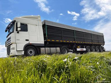 Полуприцепы - ИНТЕРПРИЦЕП 853373 ЗЕPНОBOЗ СAMOСBAЛЬHЫЙ С БОКOBЫМ CBАЛОМ