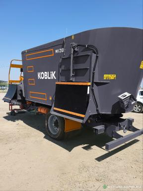 Кормораздатчики-смесители - KOBLiK Смеситель-раздатчик кормов MV 210, на несущей раме с передним транспортером + 1 лоток