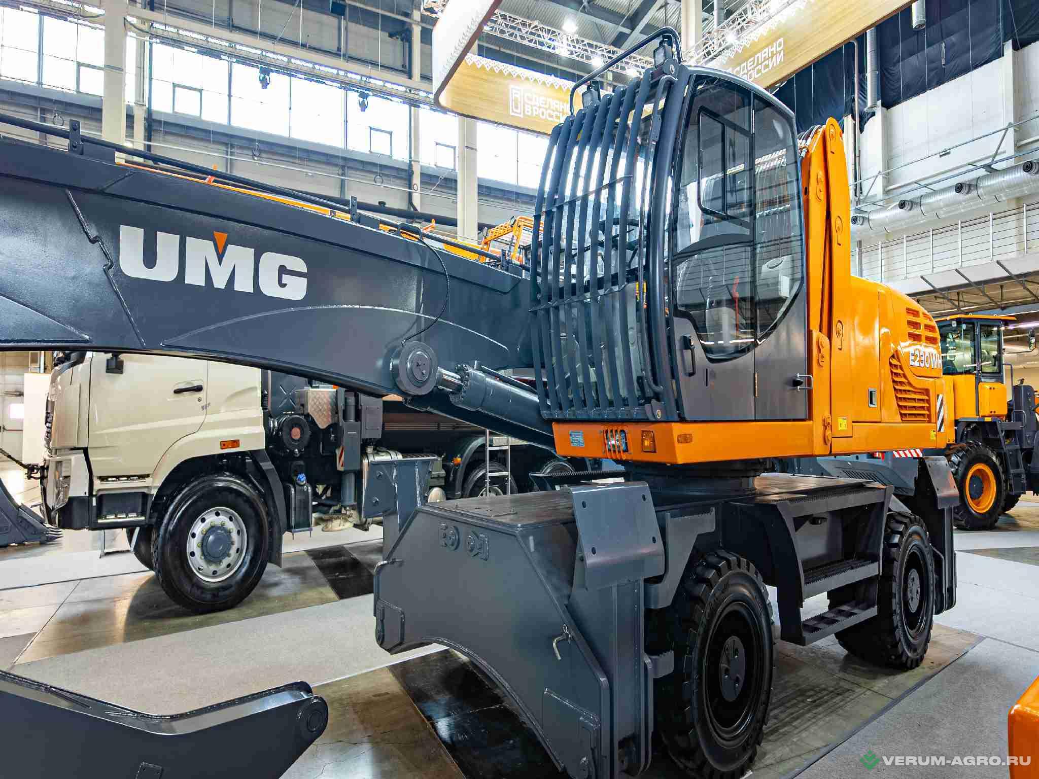 Прочее - UMG Грейферный погрузчик (перегружатель) E230WH 